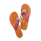 Brighton pink leather thong sandals with silver-tone floral medallion accents and tan footbeds on a white background