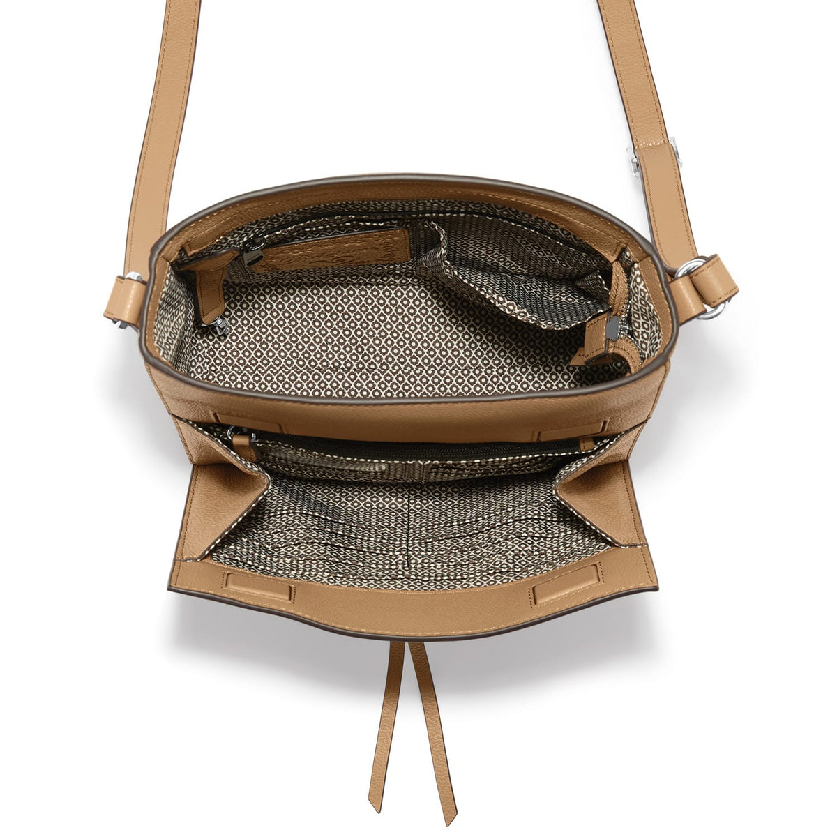 Brighton tan leather crossbody handbag shown open with patterned interior lining and adjustable strap on a white background