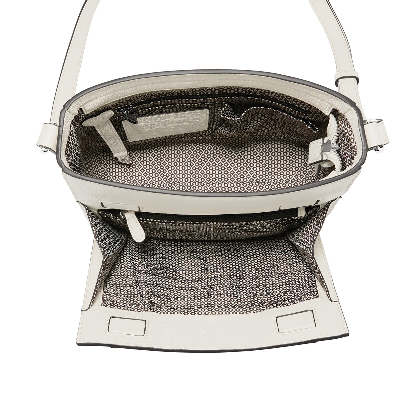 Close-up of Brighton white leather handbag interior view showing patterned fabric lining and zippered pocket
