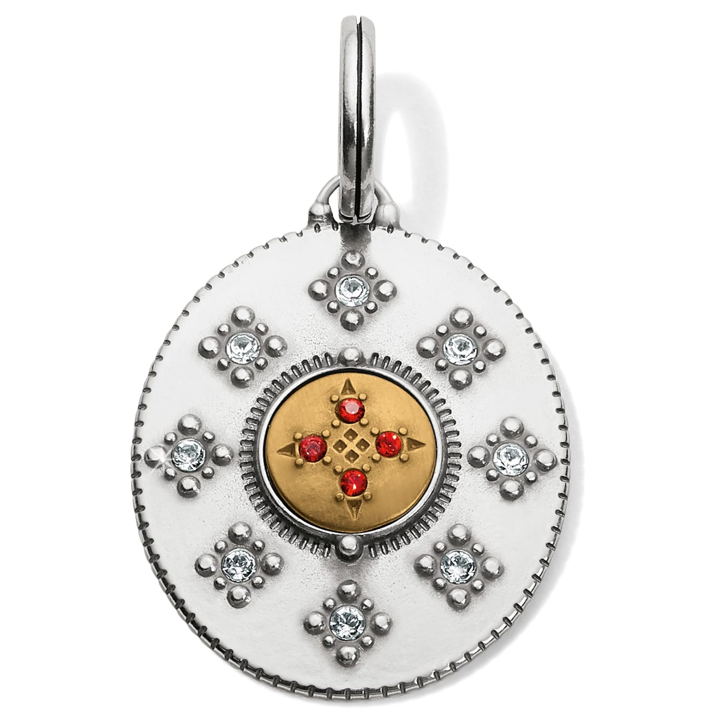 Brighton medallion charm with silver-tone star motifs, clear crystals, and gold-tone center with red crystals on a white background