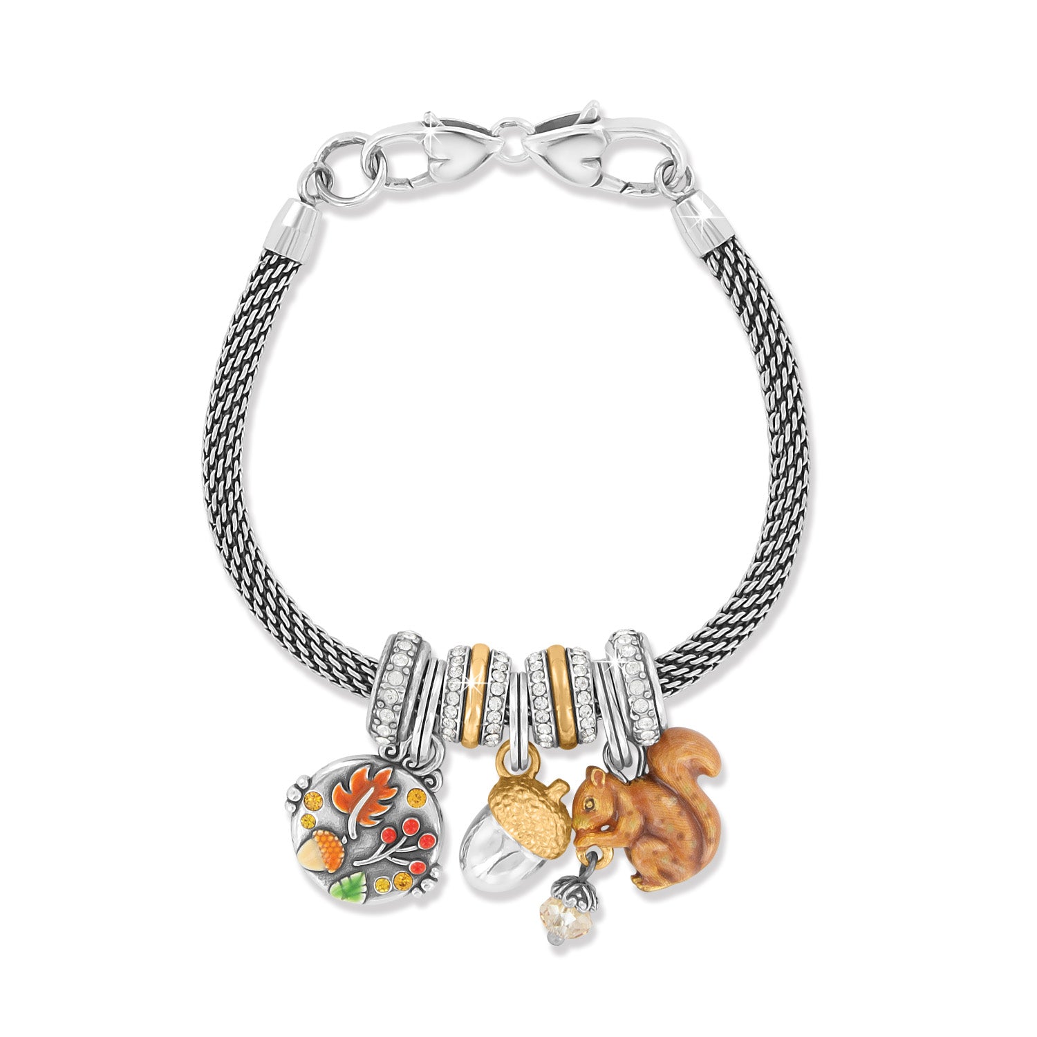 Brighton silver-plated charm bracelet with enamel squirrel, acorn, and autumn leaf charms with crystals on a white background