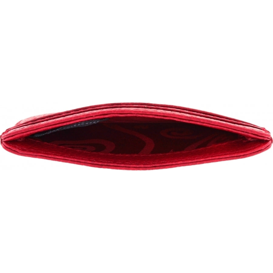 Brighton red leather card case shown open from above with patterned dark red interior lining on a white background