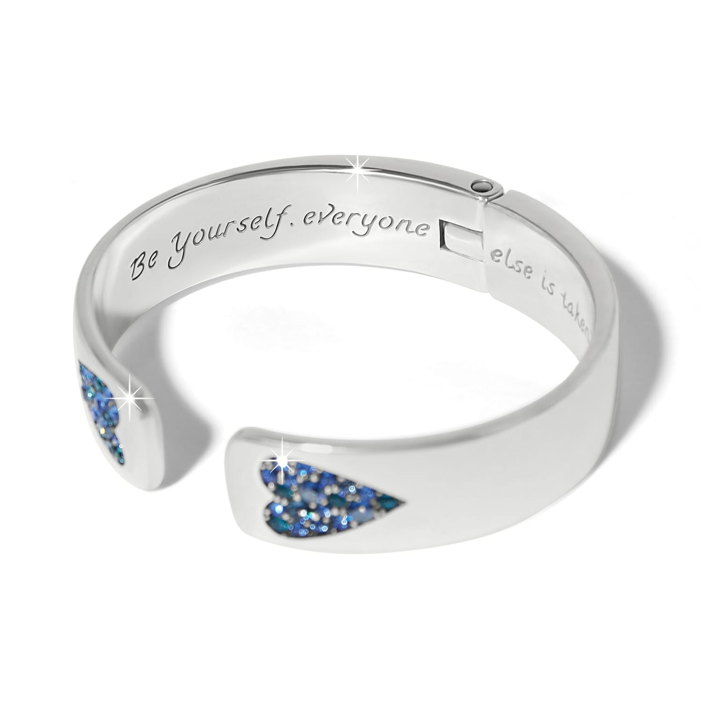 Brighton hinged cuff bracelet with silver-plated finish, blue crystal accents, and engraved inscription inside on a white background