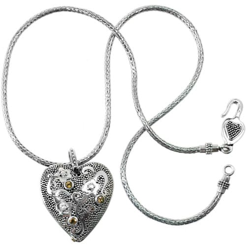 Brighton heart pendant necklace in sterling silver with crystal accents, textured detailing, and hook clasp on a white background