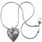 Brighton heart pendant necklace in sterling silver with red crystal accents and rope chain on a white background