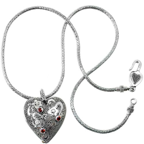Brighton heart pendant necklace in sterling silver with red crystal accents and rope chain on a white background