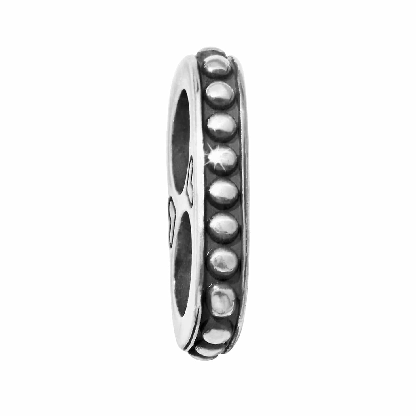 Brighton spacer charm shown from the side with silver-plated beaded edge and openwork detail on a white background