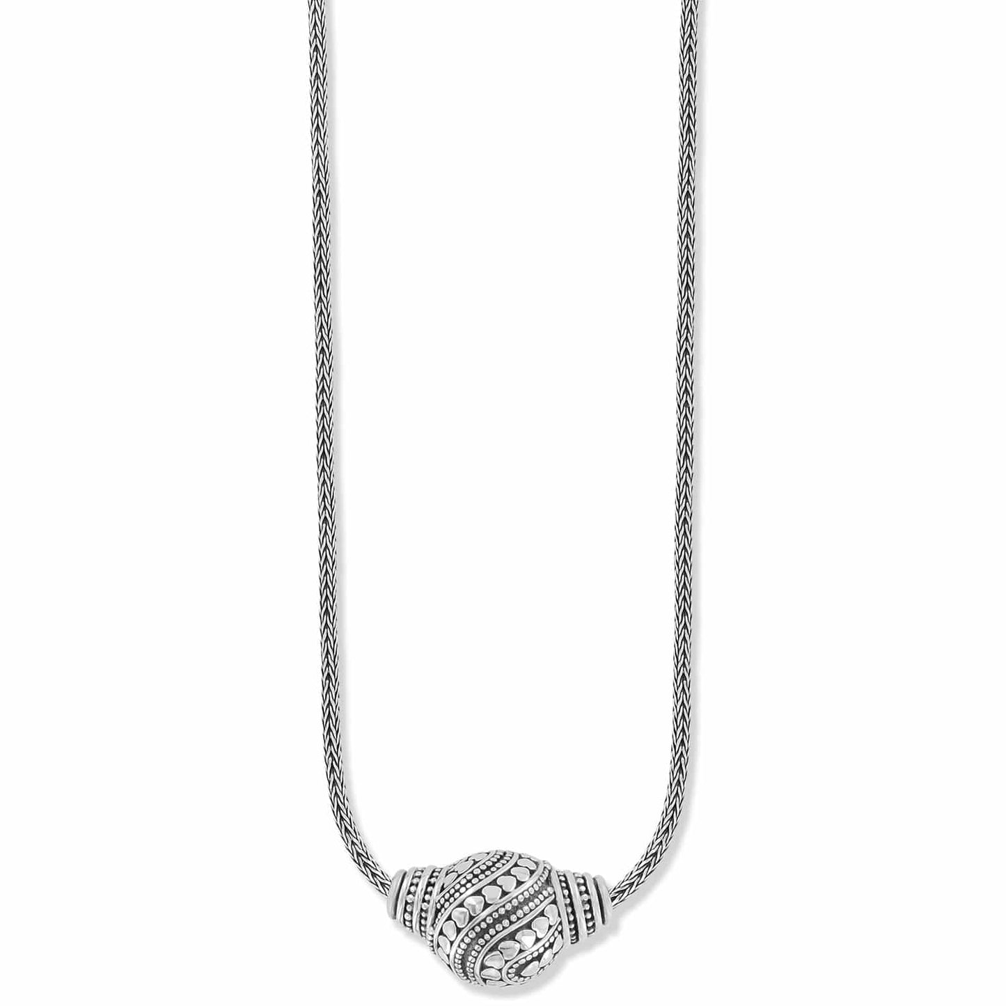 Brighton pendant necklace with sterling silver woven chain and textured swirl bead centerpiece on a white background
