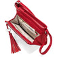 Brighton red leather handbag shown open with interior card slots, zip pocket, phone, and tassel pull on a white background