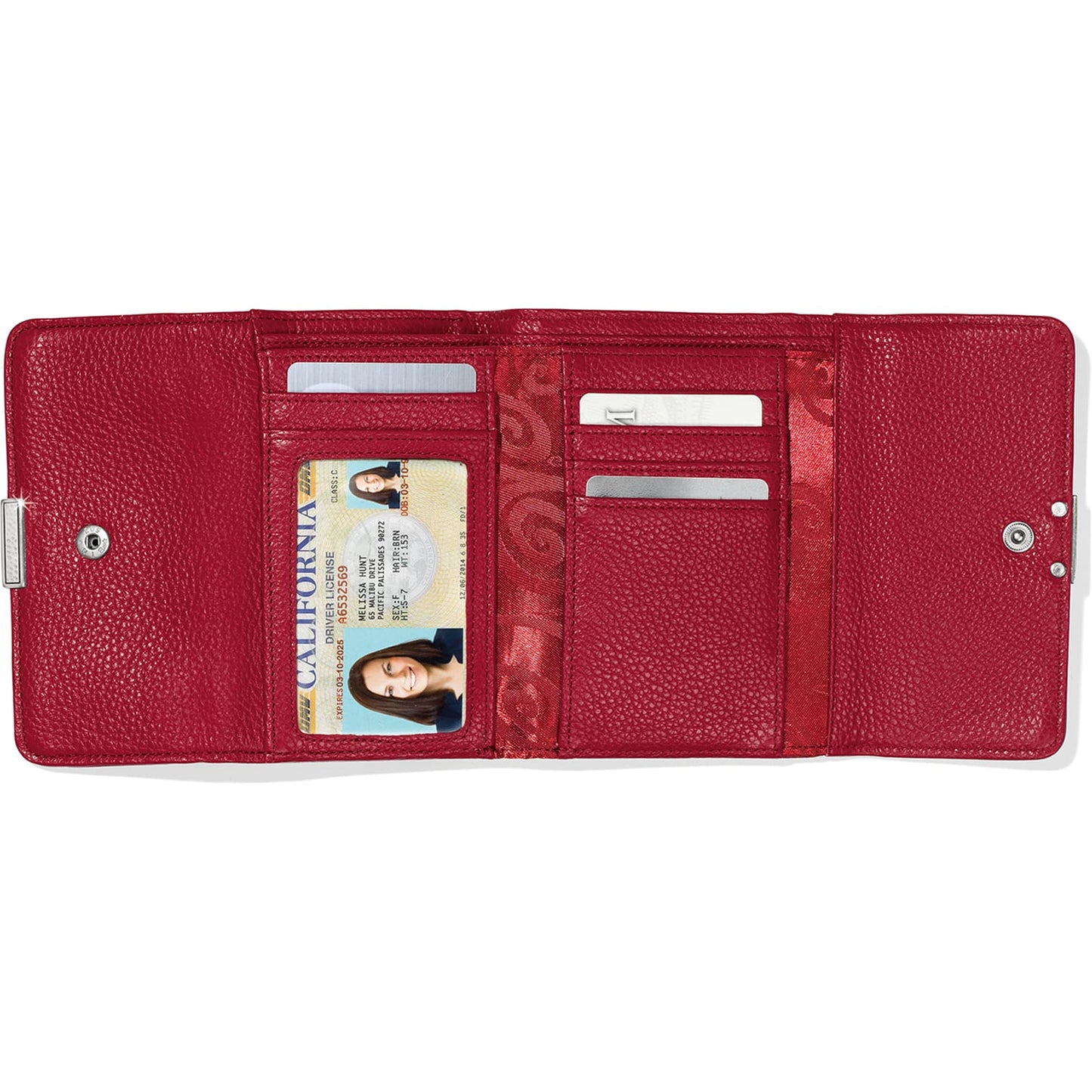 Brighton red leather trifold wallet shown open with ID window, card slots, and patterned interior lining on a white background