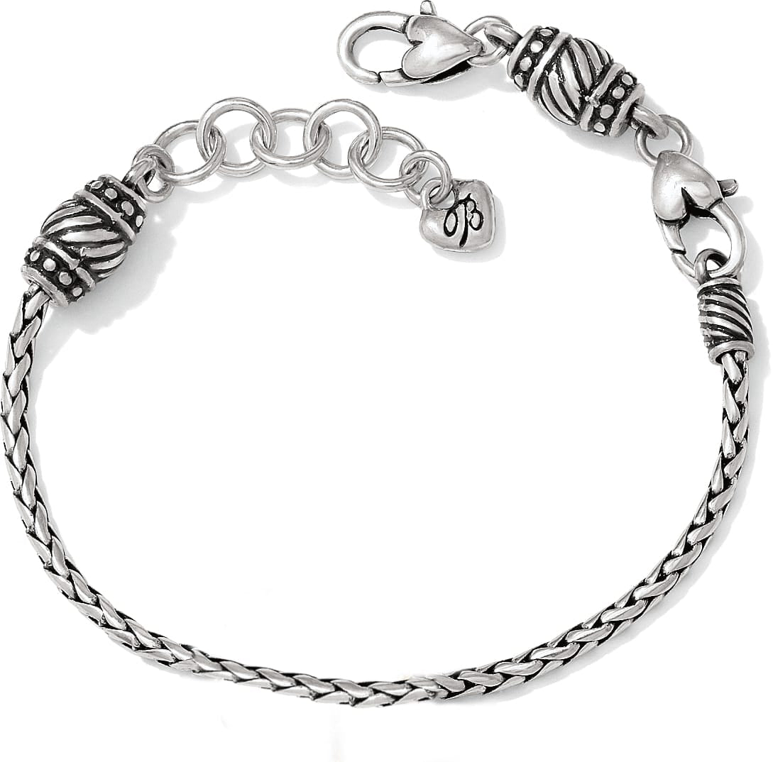 Brighton braided chain bracelet with silver-plated ornate beaded caps, lobster clasp, and heart charm on a white background