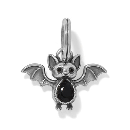 Brighton bat charm with silver-plated finish, black faceted crystal belly, and spread wings on a white background
