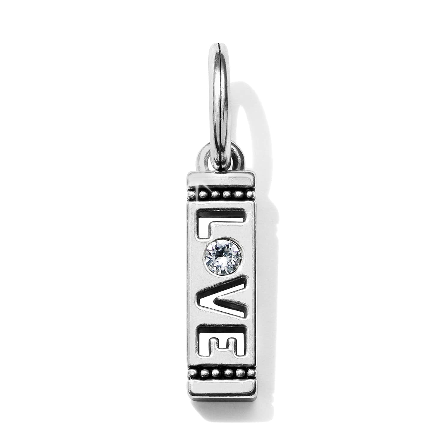 Brighton silver-plated charm with cutout LOVE lettering, crystal accent, and beaded borders on a white background