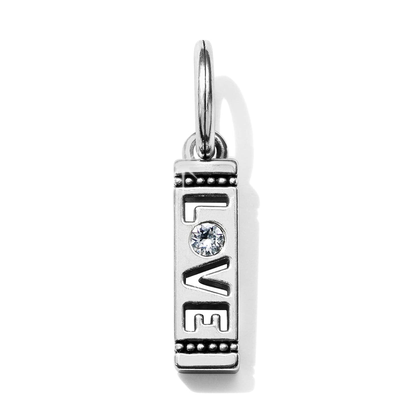 Brighton silver-plated charm with cutout LOVE lettering, crystal accent, and beaded borders on a white background