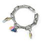 Brighton silver-plated charm bracelet with enamel flip-flop, beach ball, crystal, and surfboard charms on a white background