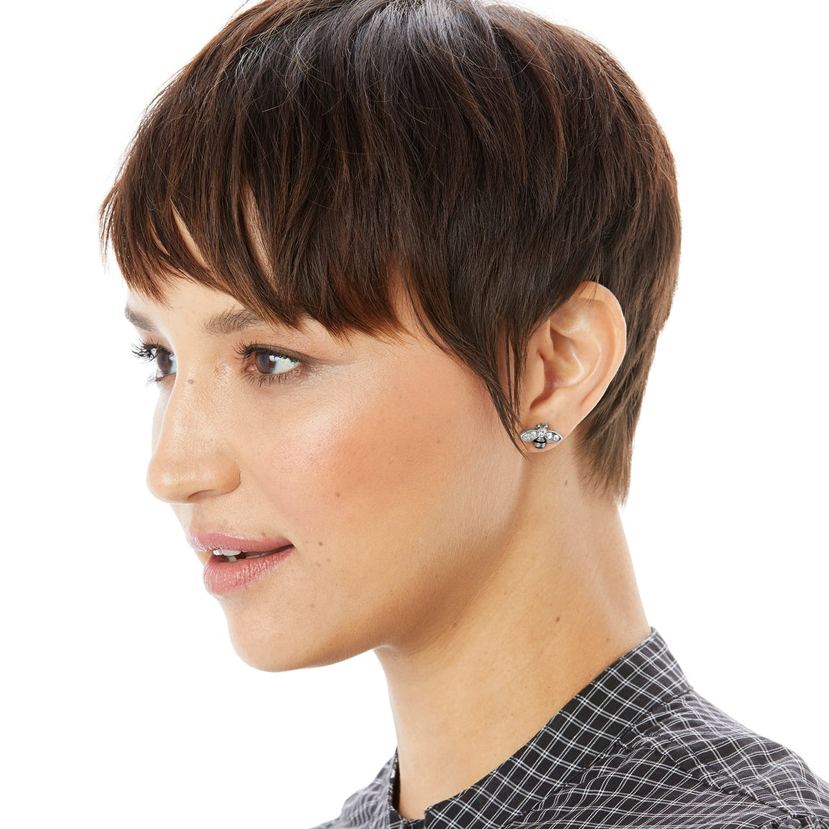 Model wearing a Brighton silver-plated bee stud earring with crystal accents on the wings