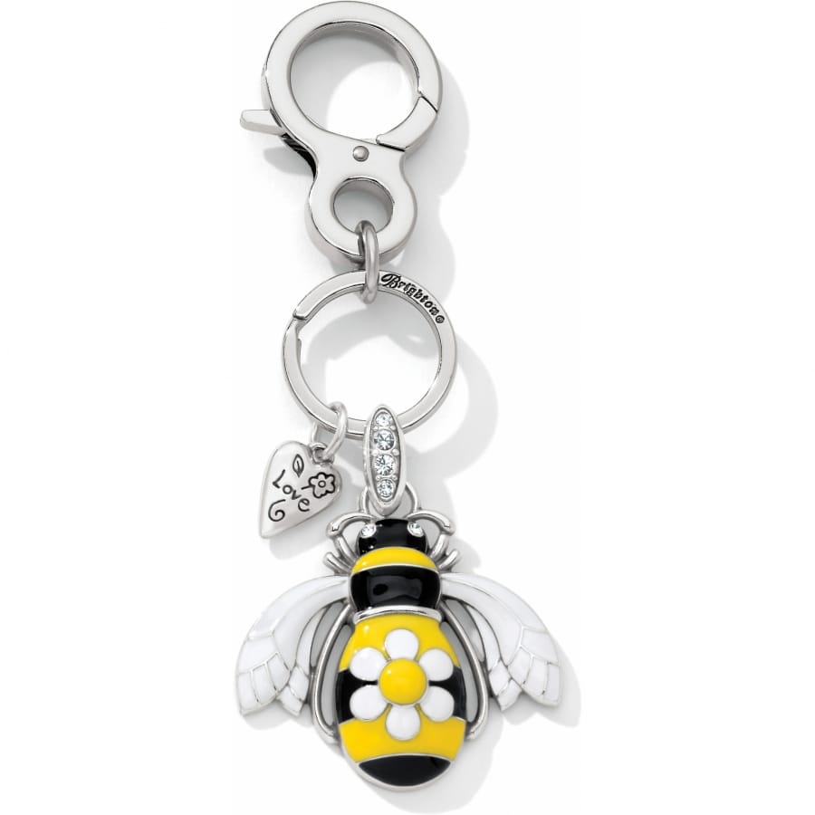 Brighton bee key fob with yellow and black enamel, white daisy accent, and crystal-set bail on a white background