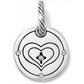 Brighton silver-plated charm with concentric heart design, crystal accents, and rope-textured bail on a white background