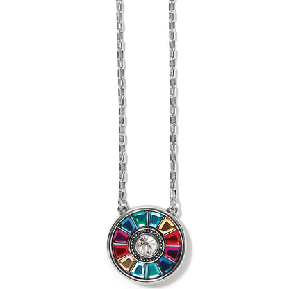 Brighton pendant necklace with multicolored crystals surrounding a central crystal and silver-plated chain on a white background