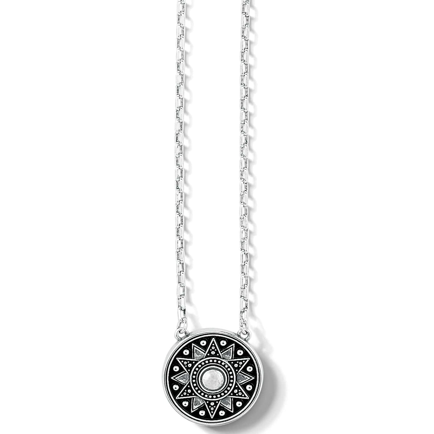 Brighton pendant necklace with silver-plated round medallion featuring star motif and crystal center on a white background