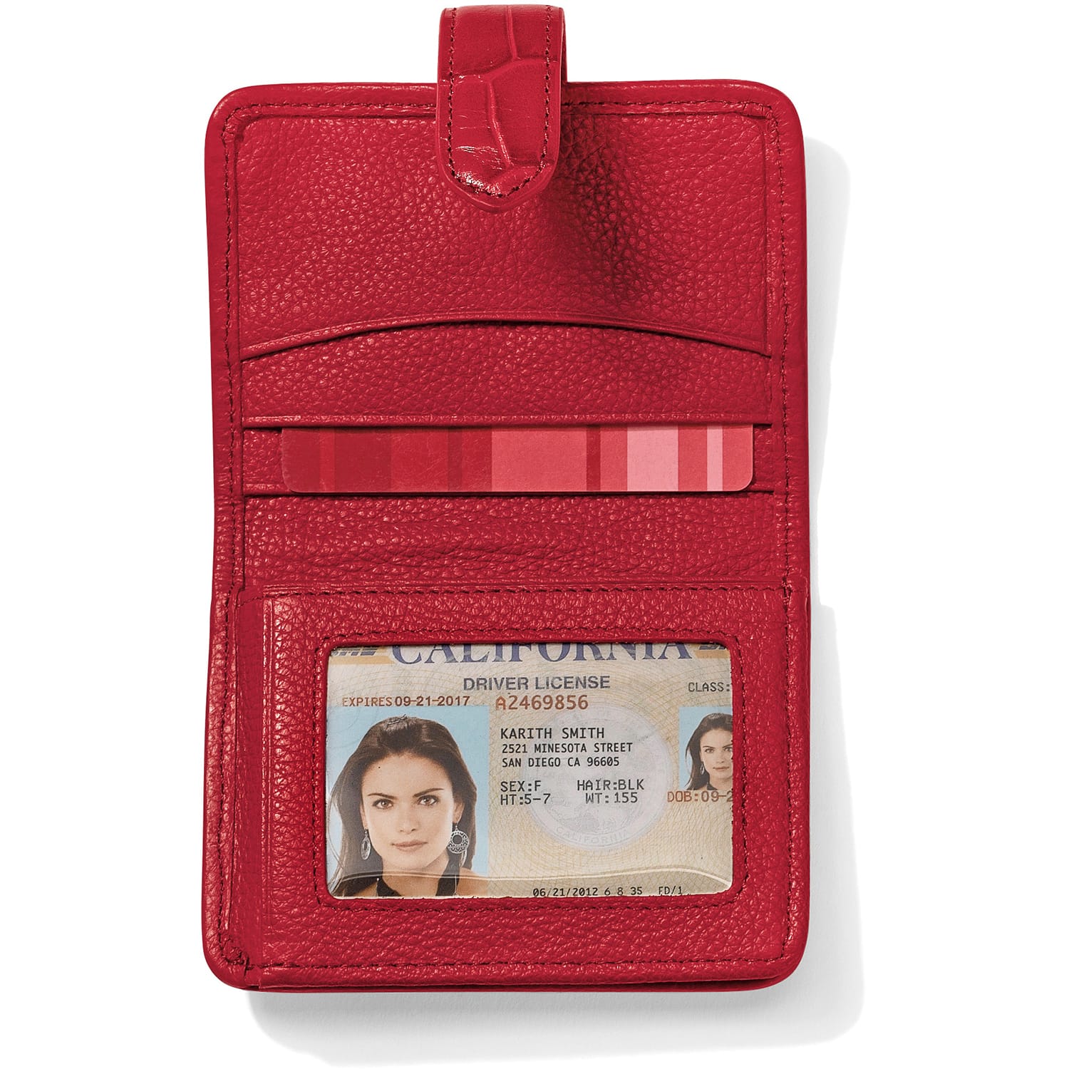 Brighton red leather wallet shown open with card slots, ID window, and snap closure tab on a white background