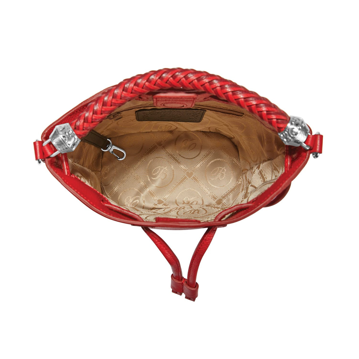 Close-up of Brighton red handbag interior view showing patterned tan lining and silver-tone hardware accents