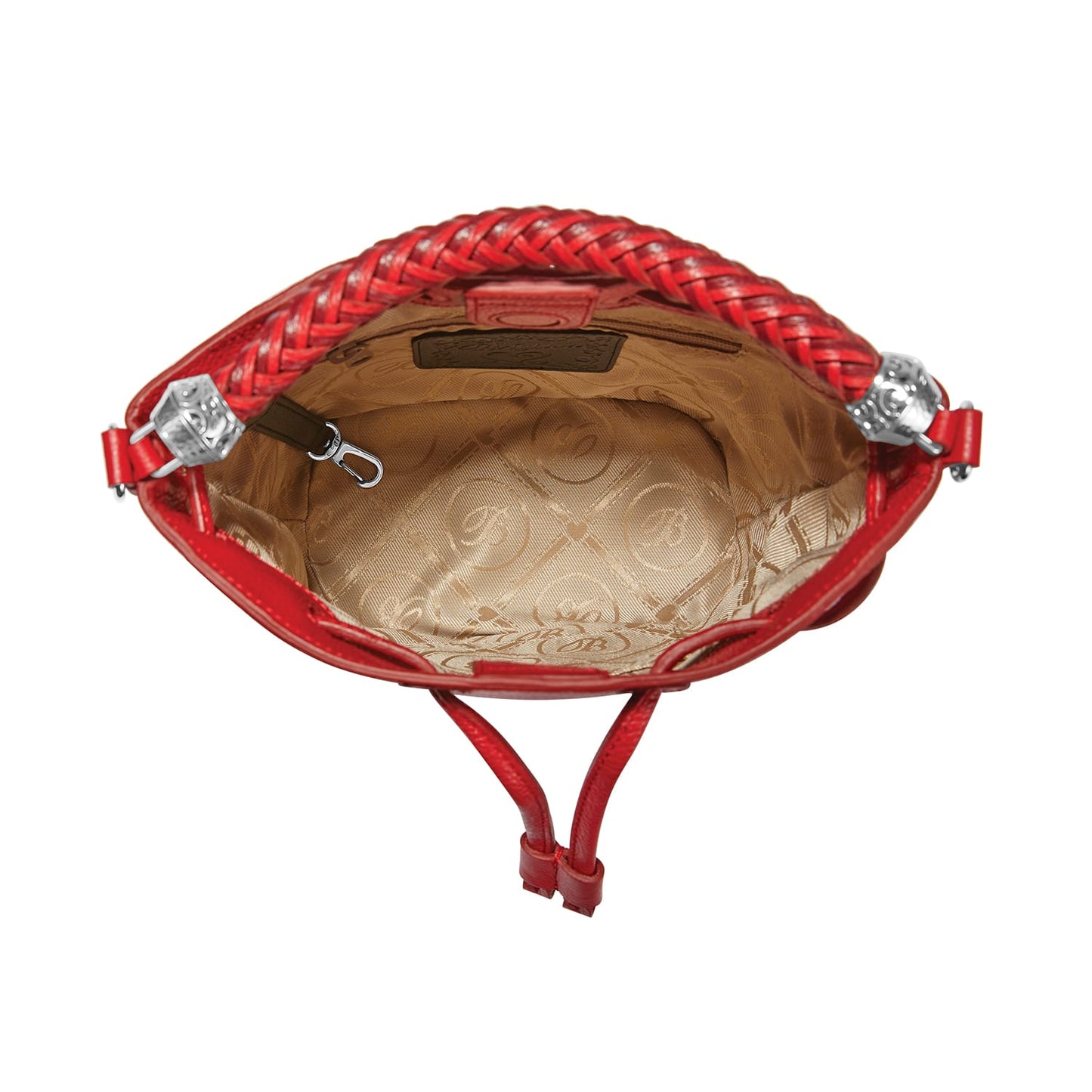 Close-up of Brighton red handbag interior view showing patterned tan lining and silver-tone hardware accents