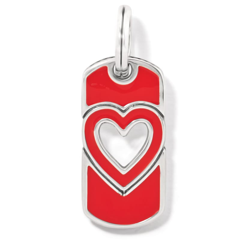 Brighton charm with red enamel dog tag design and silver-plated cutout heart accent on a white background