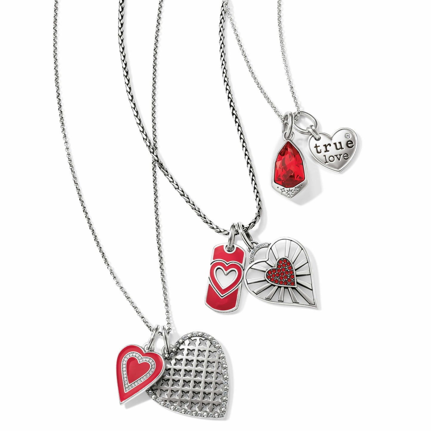 Brighton silver-plated necklaces with heart charms, red enamel accents, and red crystal pendants on a white background