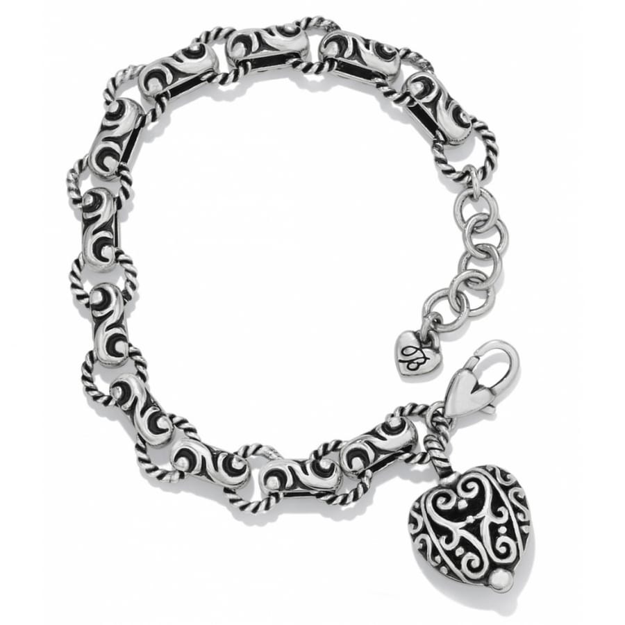 Brighton charm bracelet with silver-plated scrollwork links, ornate heart charm, and lobster clasp on a white background