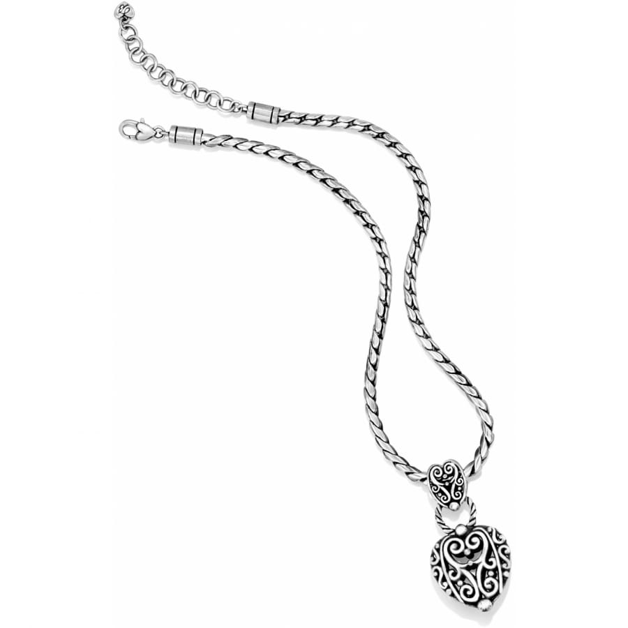 Brighton pendant necklace with silver-plated heart pendant featuring scroll filigree detail and rope chain on a white background