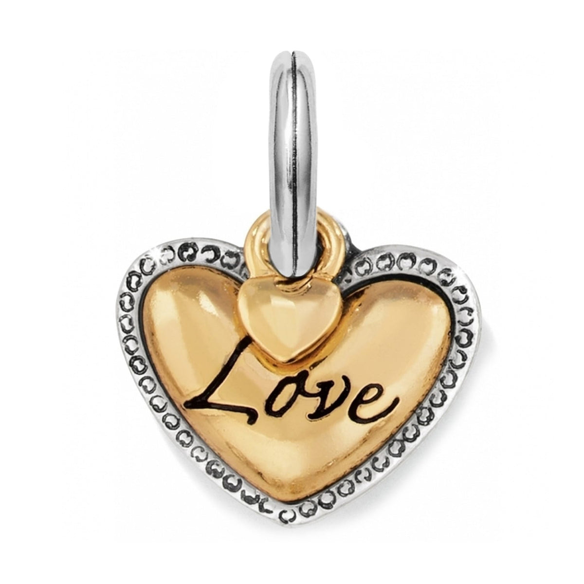 Brighton heart charm with gold-tone center engraved Love and beaded silver-tone border on a white background