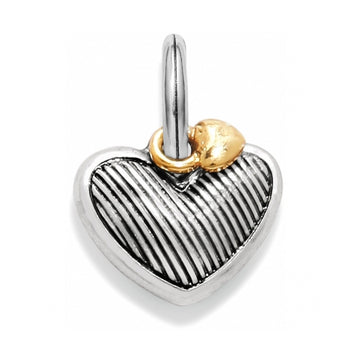 Brighton heart charm with silver-tone ribbed texture and small gold-tone accent heart on a white background
