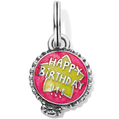 Brighton charm with pink and yellow enamel Happy Birthday design and silver-plated beaded border on a white background