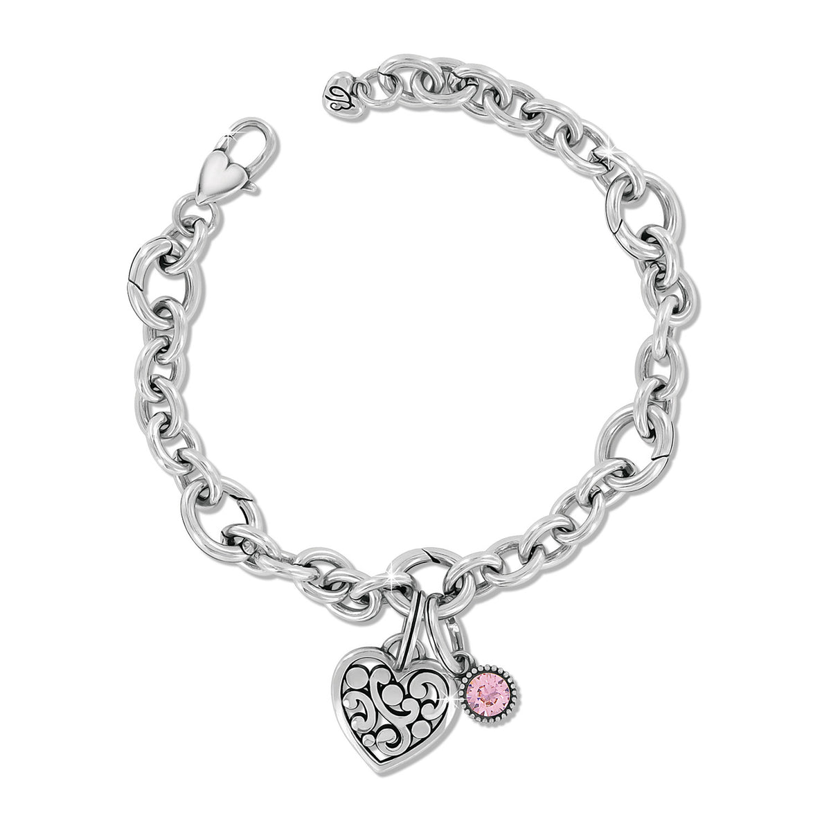 Brighton charm bracelet with silver-plated chain, filigree heart charm, and pink crystal accent on a white background