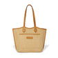 Brighton woven straw tote handbag with tan leather braided shoulder straps and front pocket on a white background
