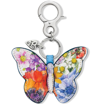 Brighton butterfly key fob charm with colorful floral print, silver-tone clip, and heart charm on a white background