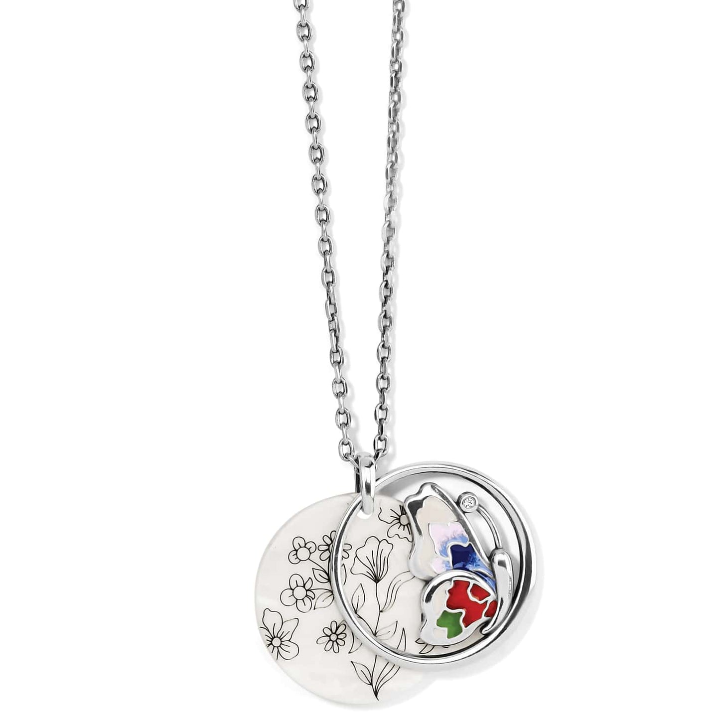 Brighton pendant necklace with floral etched disc and silver-plated enamel butterfly charm with crystal accent on a white background