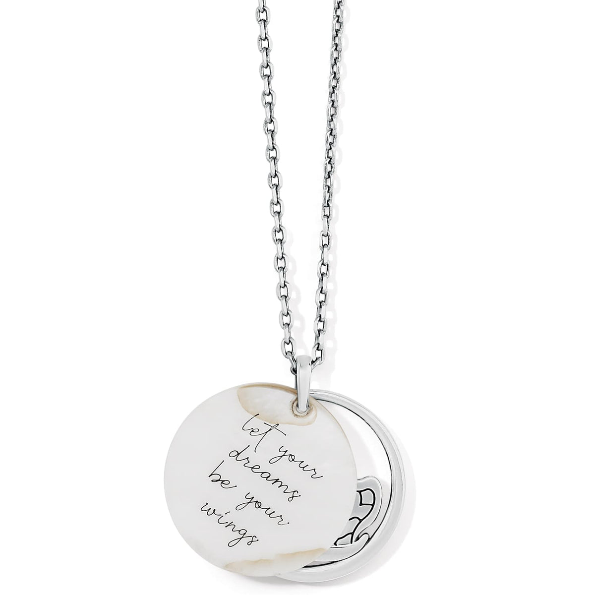 Brighton pendant necklace with silver-plated round charm engraved with script quote about dreams on a white background