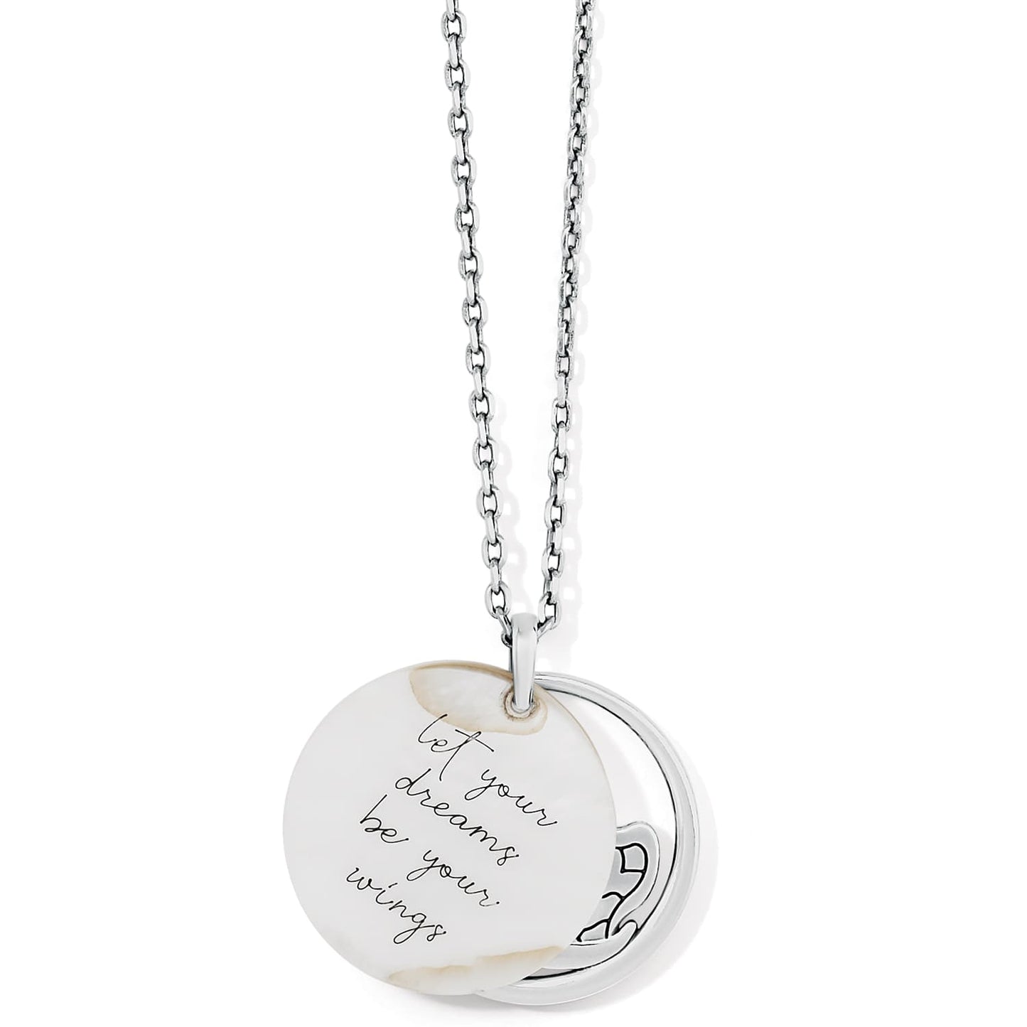 Brighton pendant necklace with silver-plated round charm engraved with script quote about dreams on a white background