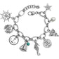Brighton charm bracelet with silver-plated nautical charms including anchor, seahorse, sailboat, crab, and star on a white background