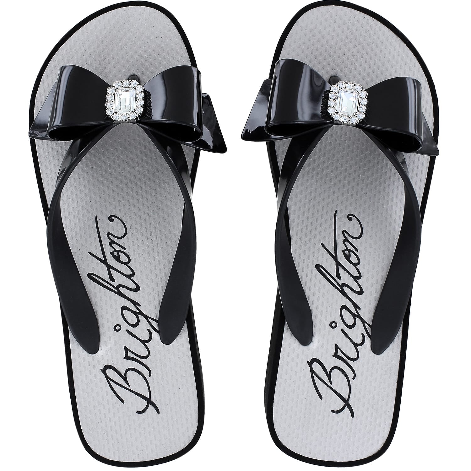 Brighton flip-flop sandals in black rubber with bow straps and crystal square medallions on a white background