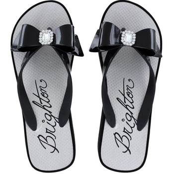 Brighton flip-flop sandals in black rubber with bow straps and crystal square medallions on a white background