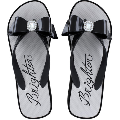 Brighton flip-flop sandals in black rubber with bow straps and crystal square medallions on a white background