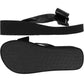 Brighton black rubber flip-flop sandals with bow accent and heart-textured sole, side and bottom views on a white background