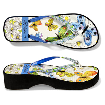 Brighton rubber platform flip-flop sandals with butterfly and daisy print and crystal accent on a white background
