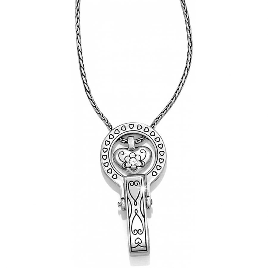 Brighton pendant necklace with silver-plated round heart-etched medallion and scrollwork clip pendant on a white background