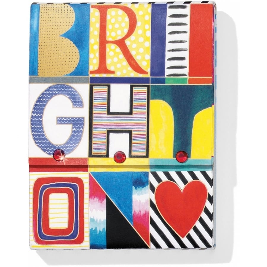 Brighton journal with colorful BRIGHT ON typographic print, red gem accents, and heart motif on a white background