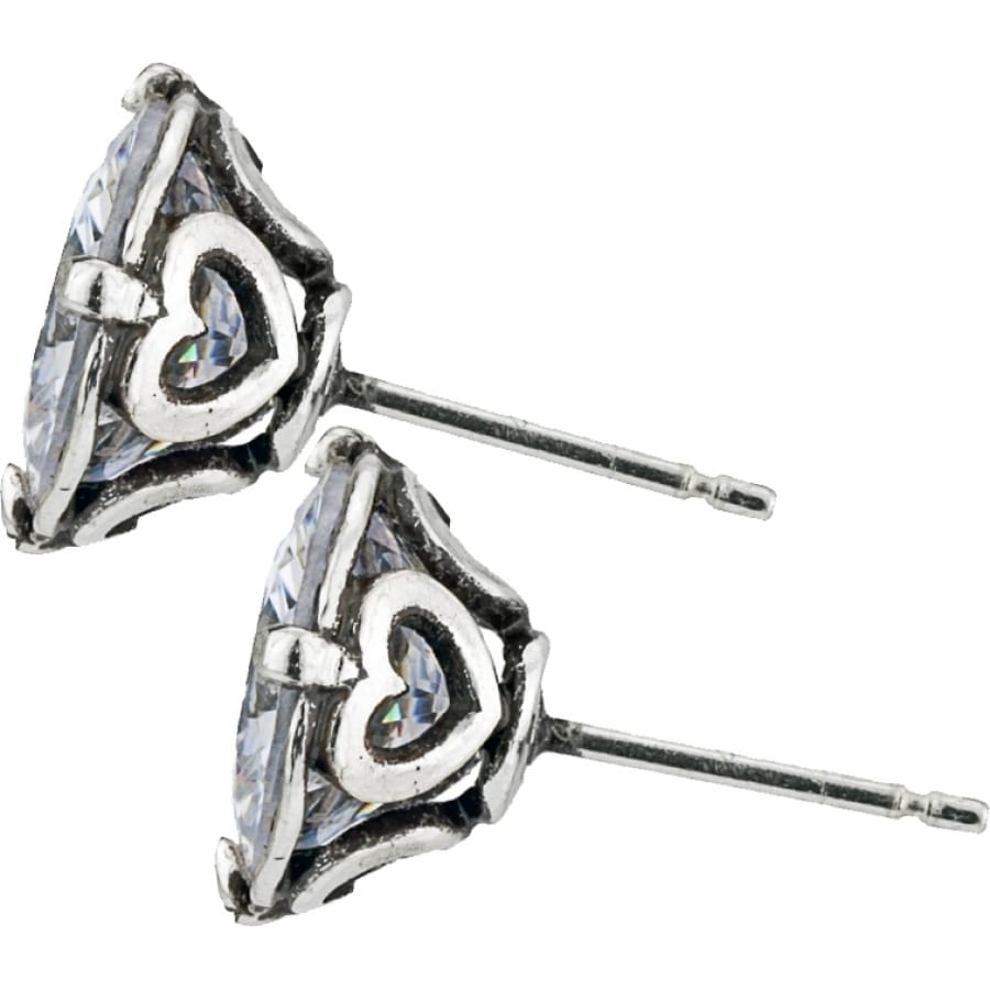 Brighton stud earrings with faceted crystal centers, silver-plated heart accents, and posts on a white background