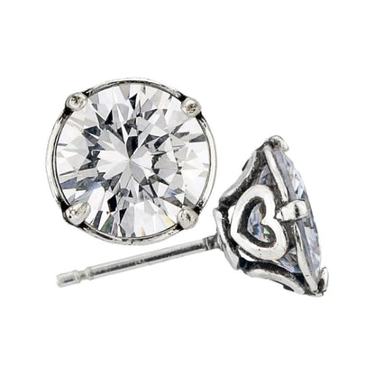 Brighton stud earrings with round faceted crystals and silver-plated scrollwork prong settings on a white background